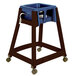 A brown Koala Kare high chair with blue seat and wheels.