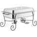 A silver Choice stainless steel chafer on a black wrought iron stand.
