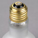 A close up of a Carnival King 50W replacement light bulb with a gold cap.