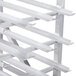 A Winholt aluminum stationary can rack with metal bars.