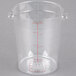 A Carlisle clear polycarbonate food storage container with red measuring lines.