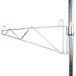 A Metro stainless steel wall mount shelf support pole.