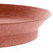 A close up of a red HS Inc. round deli server bowl with a brown rim.