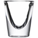 A close-up of a clear Libbey shot glass with a curved bottom.