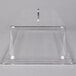 A clear plastic rectangular pastry tray cover with a metal ring.