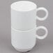 A stack of white Arcoroc Daring porcelain coffee cups with handles.