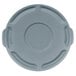 A gray plastic Rubbermaid lid for a 10 gallon round trash can with handles and a circular hole.