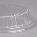 A Dart clear plastic lid with a small ribbed top.