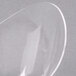 A close up of a clear plastic Fineline Tiny Tureens bowl.