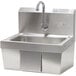 An Advance Tabco stainless steel hand sink with a faucet.