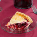 A slice of cherry pie on an Anchor Hocking glass plate.