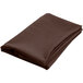 A folded brown cloth on a white background.