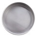 A round silver metal pan with straight sides.