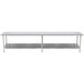 A long silver stainless steel table with undershelves.