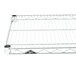 A Metro Super Erecta stainless steel wire shelf with a metal base and two holes.