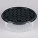 A black plastic D&W Fine Pack cake container with a clear lid.
