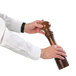 A person holding a Chef Specialties walnut pepper mill.