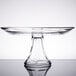 A clear glass Anchor Hocking cake stand with a pedestal base.