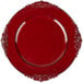 A set of 12 round red plastic charger plates with an ornate design.