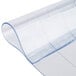 Curtron Step-In Refrigerator / Freezer Strip Door replacement strips, a clear plastic sheet with a curved edge.