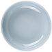 A light blue Thunder Group Blue Jade melamine bowl with a white rim.