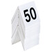 A stack of white number cards with the numbers 26 to 50.