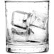 A glass of water with Scotsman medium cube ice cubes.