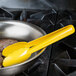 Mercer Culinary M35100YL Hell's Tools® 9 1/2" Yellow High Temperature Plastic Tongs Main Thumbnail 1