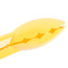 Yellow high temperature plastic tongs with a hole in the handle.