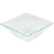 A clear square acrylic bowl with a diamond pattern.