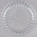 A Libbey clear glass salad plate with a circular design.