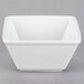 A white square Tuxton china bowl.