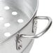An aluminum Town steamer pot with holes in it.