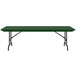 A green rectangular Correll folding table with black legs.