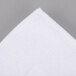 A white Oxford Miasma bath mat on a gray surface.