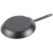 A Lodge carbon steel frying pan with a handle.