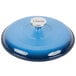 The lid of a Lodge Caribbean Blue Enameled Cast Iron Dutch Oven with a silver handle.