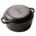 A black Lodge round cast iron pot with a lid.