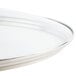 A Lodge tempered glass cover with a circular white rim.