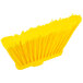 A close-up of a Carlisle yellow broom with long bristles.