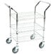 A Regency chrome utility cart with three shelves and wheels.