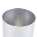 A close-up of a silver cylinder with a white background.