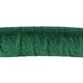 A green fabric roll with brass ends.