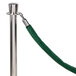 A green fabric rope with silver metal ends.