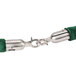 A green metal rope with silver ends.