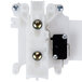 A white plastic Waring actuator switch with screws.