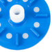 A blue and white plastic disc with holes.