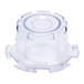 A clear plastic lid baffle for a Waring blender.