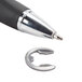 A Waring E-Ring on a table with a pen