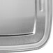 A close up of a stainless steel Waring drip pan.